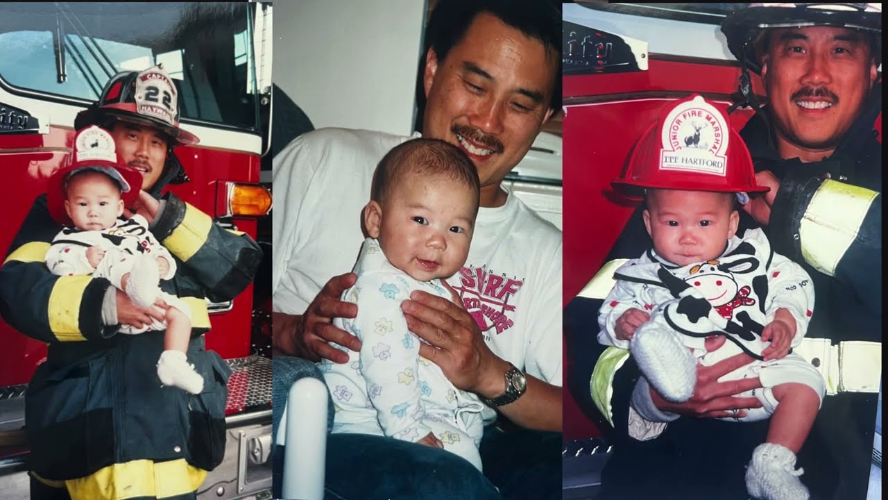 Melvin Lum in his fire-captain gear, holding his child